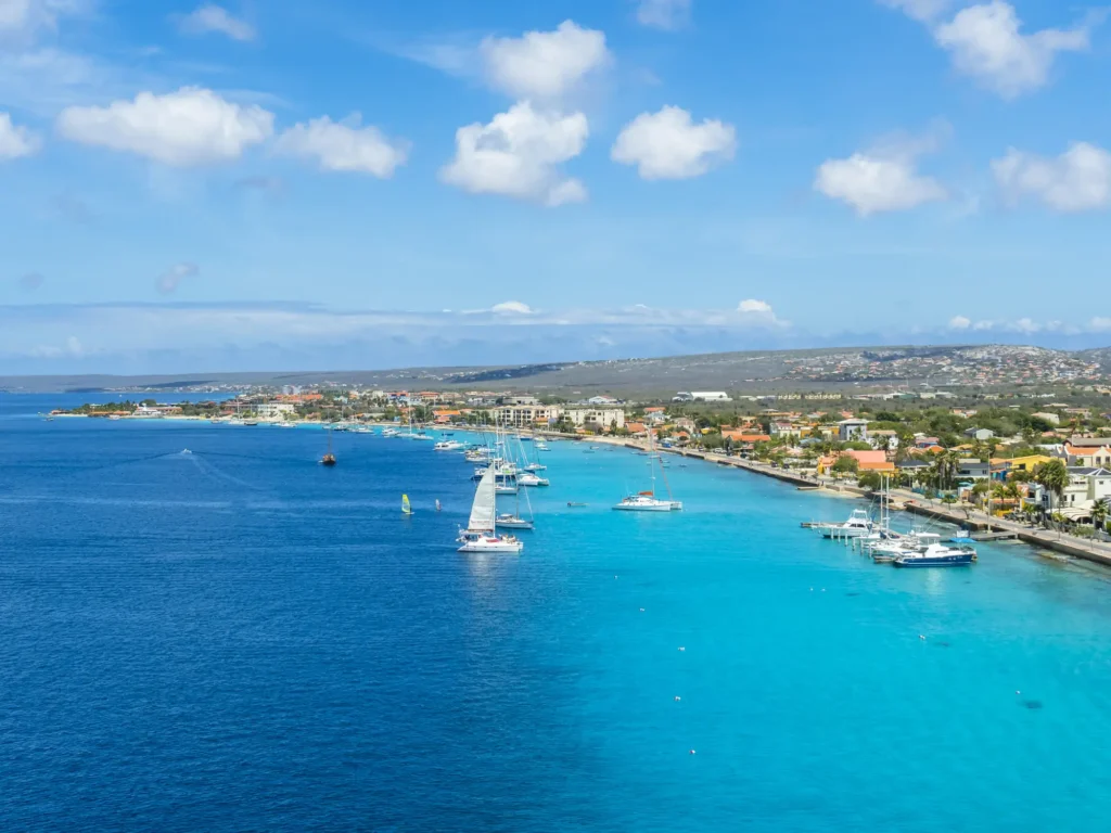Aruba coastline with boats and clear blue water