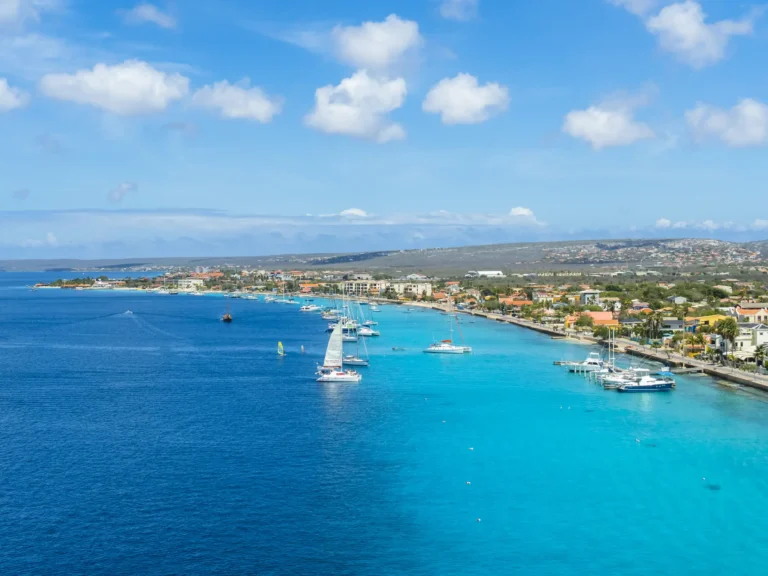 Aruba coastline with boats and clear blue water