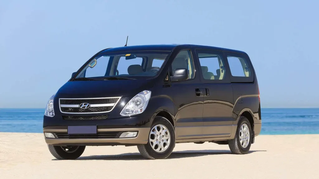 Black Hyundai H1 12-seater van