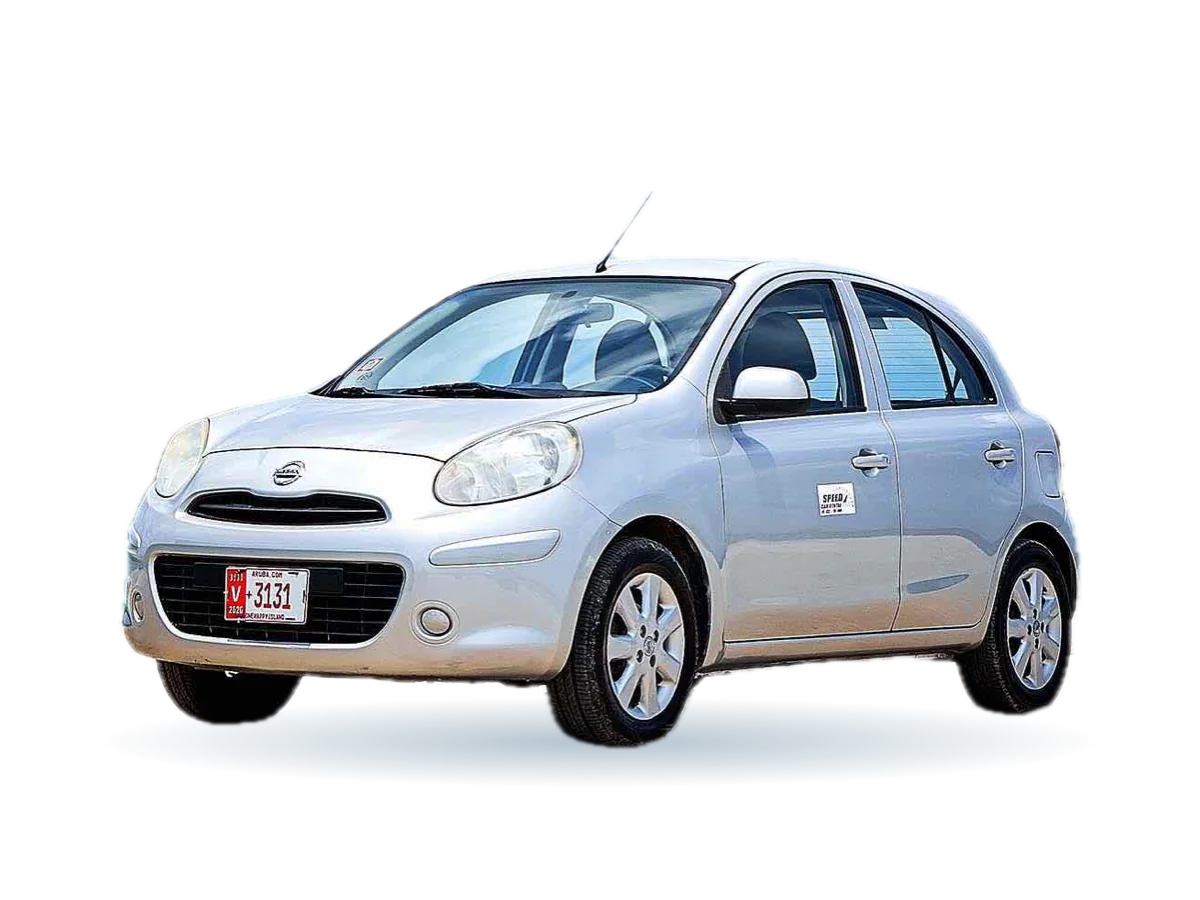 Silver Nissan March rental car in Aruba