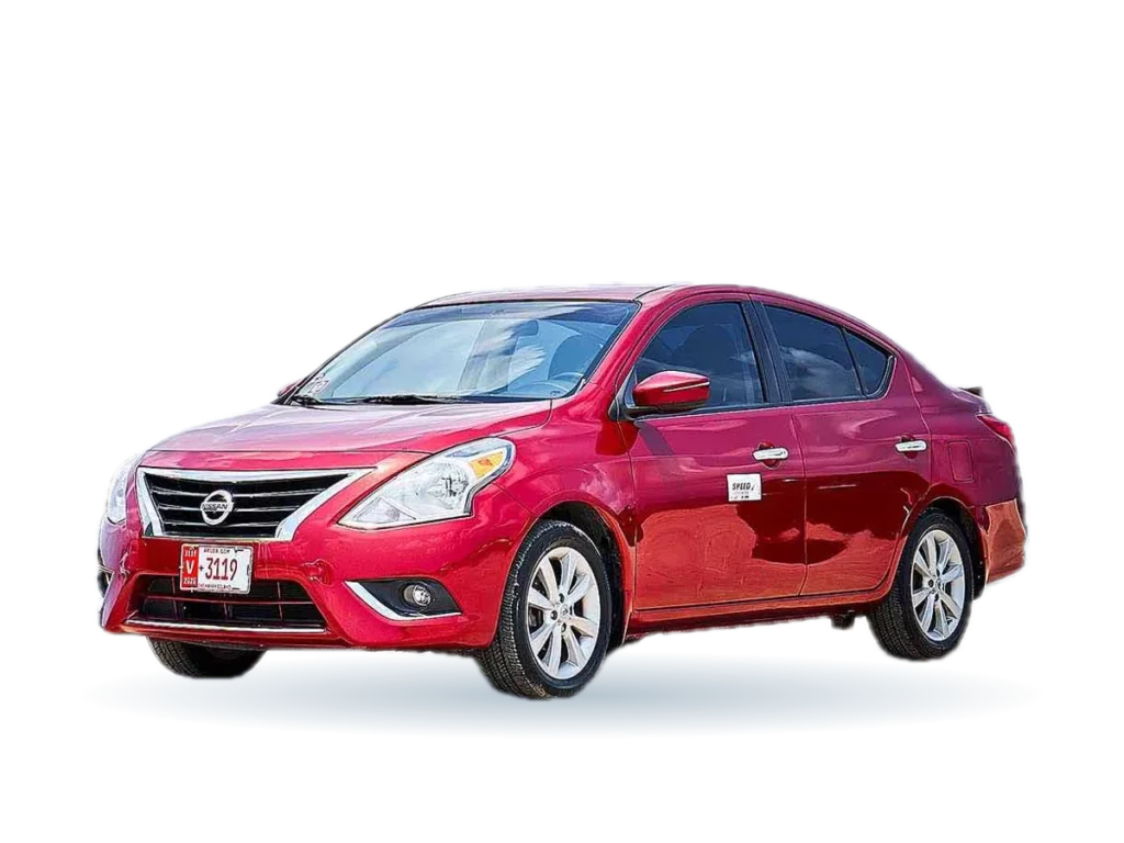 Red Nissan Versa rental car in Aruba