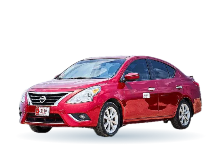 Red Nissan Versa rental car in Aruba