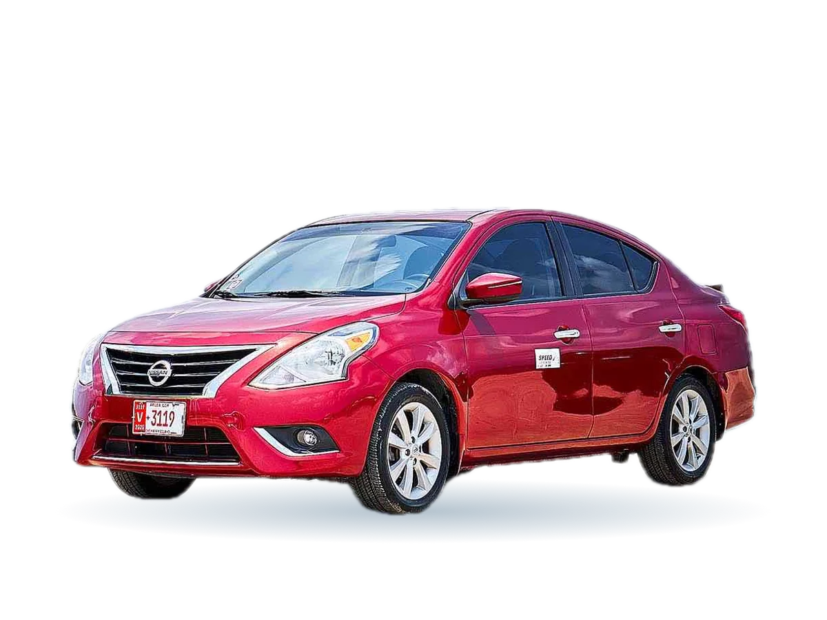 Red Nissan Versa rental car in Aruba